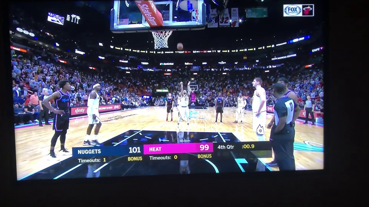 Miami Heat fan runs on court after foul shot! YouTube
