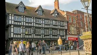 Travel back to Edwardian Lincoln on the High Street at High Bridge