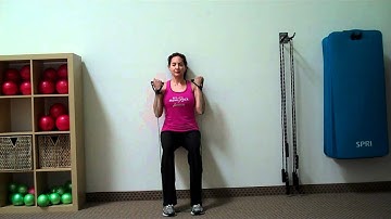 wall sit with bicep curl