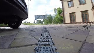 Amazing Lego train action under the real car