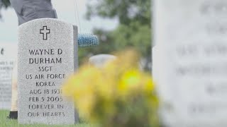 Volunteers clean headstones at Memphis National Cemetery in remembrance of 9/11