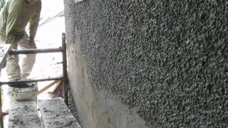 Applying pebble dash stucco