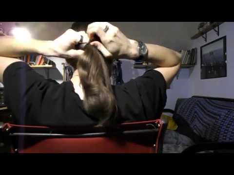 long-haired-man-tying-a-segmented-ponytail