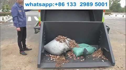 Rear loading compactor garbage truck loading rubbish video