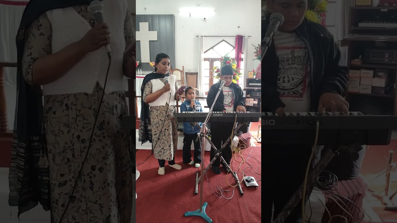 #Jason is singing Chattan song in c.n.i. church with his family 