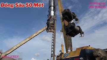 Xe Cuốc Độ Cần 15 Mét Đóng Cọc Bê Tông Sâu 50 Mét.Rung Rinh Cả Mặt Đất.