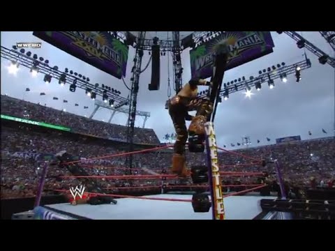 John Morrison delivers a top rope moonsault while holding a steel ladder: WrestleMania XXIV