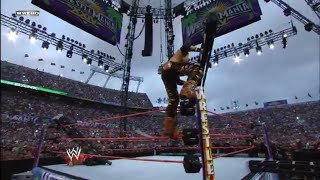 John Morrison delivers a top rope moonsault while holding a steel ladder: WrestleMania XXIV