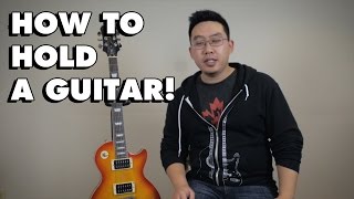 Pro Guitar Tips: HOW TO HOLD A GUITAR