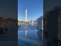 World War II Memorial with view of Rainbow Pool Fountain & Washington Monument at the National Mall