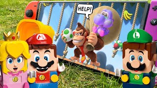 Lego Mario, Luigi, Peach enter the Nintendo Switch in Donkey Kong&Bowser's castle to save Baby Yoshi