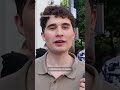 Why young Russians are holding apples in support of anti-war party