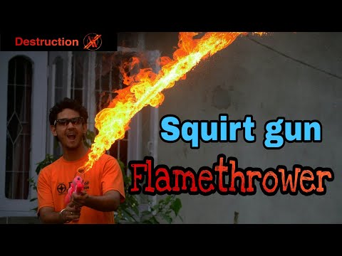 How to make a FLAMETHROWER at home using squirt gun .