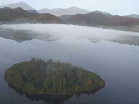 Gyroplane at dawn over the Lake District