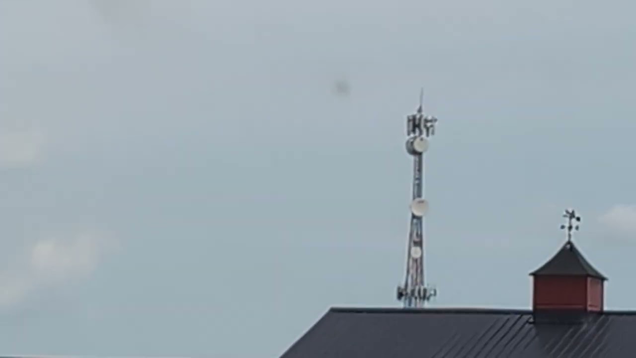 Cell and microwave tower in Middlebury, Indiana with a TWR E-1DBSL.