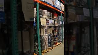Looking at Rugs at Costco