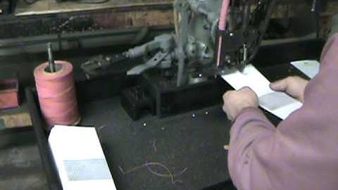 FL Smithe AEM to apply String and button to envelopes - Curtius Technologies