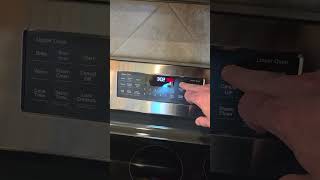 Avoid the insanity setting the clock on your GE JBS86SPSS cooking range.