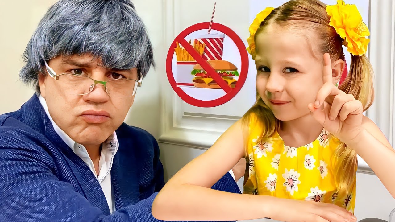 Nastya et son père font semblant de jouer à l'école