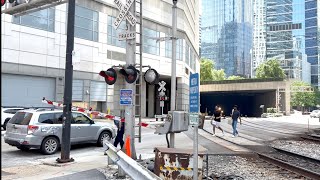 Gate Crashes down on impatient car and pedestrians ignore warning signs at Canal Street in Chicago