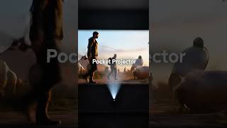 Pocket Projector | tiny projector turns any wall into a massive movie screen. #pocketprojector