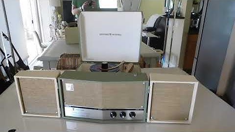 TRUETONE STEREO RECORD PLAYER playing a few 45 RPM records.