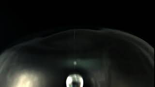 4000 frame per second showing trailing soap filament and tear