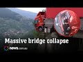 Truck dangles over edge after massive China bridge collapse