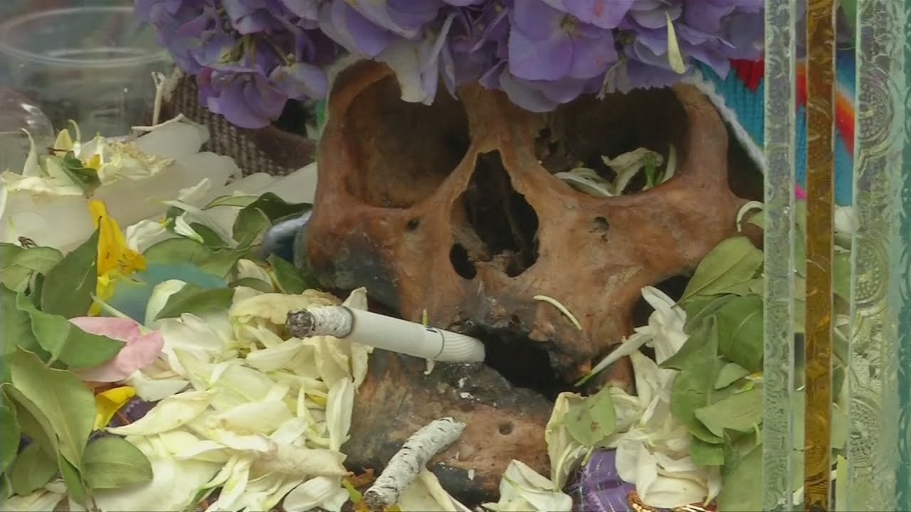 Bolivians decorate skulls for a festival to celebrate the dead