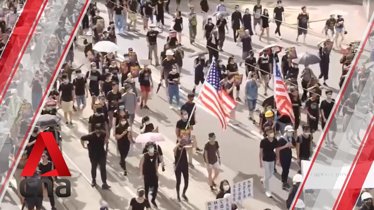 Protesters march in central Hong Kong despite police ban Protesters march in central Hong Kong despite police ban