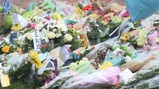 People pay tribute at scene in Leigh-on-Sea where MP was killed | AFP