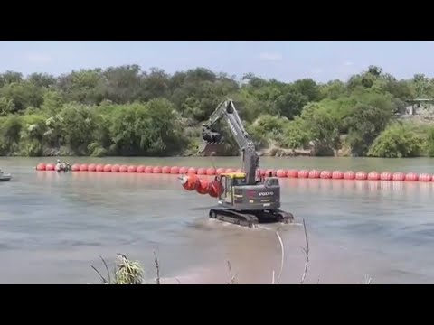 Biden administration sues Texas governor over Rio Grande buoy barrier ...