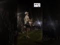 Attendees unite in song by a University of Florida senior at Charlie Kirk's vigil in Gainesville
