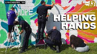 Lynchburg Police win Highlighting Heroes photo contest for helping paint local mural