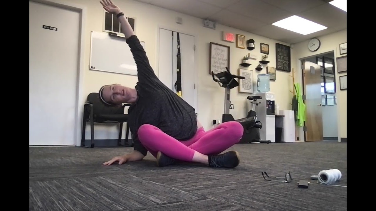 side bend stretch in criss cross sitting mov nat