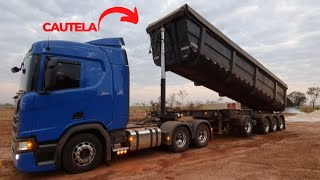 Como Descarregar caçamba 4°eixos 