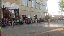 Beautiful young women performing a flirtatious dance.