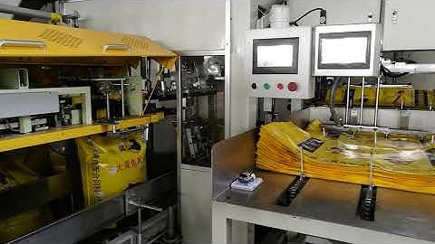Automatic heavy bag packing machine+ palletizing robot
