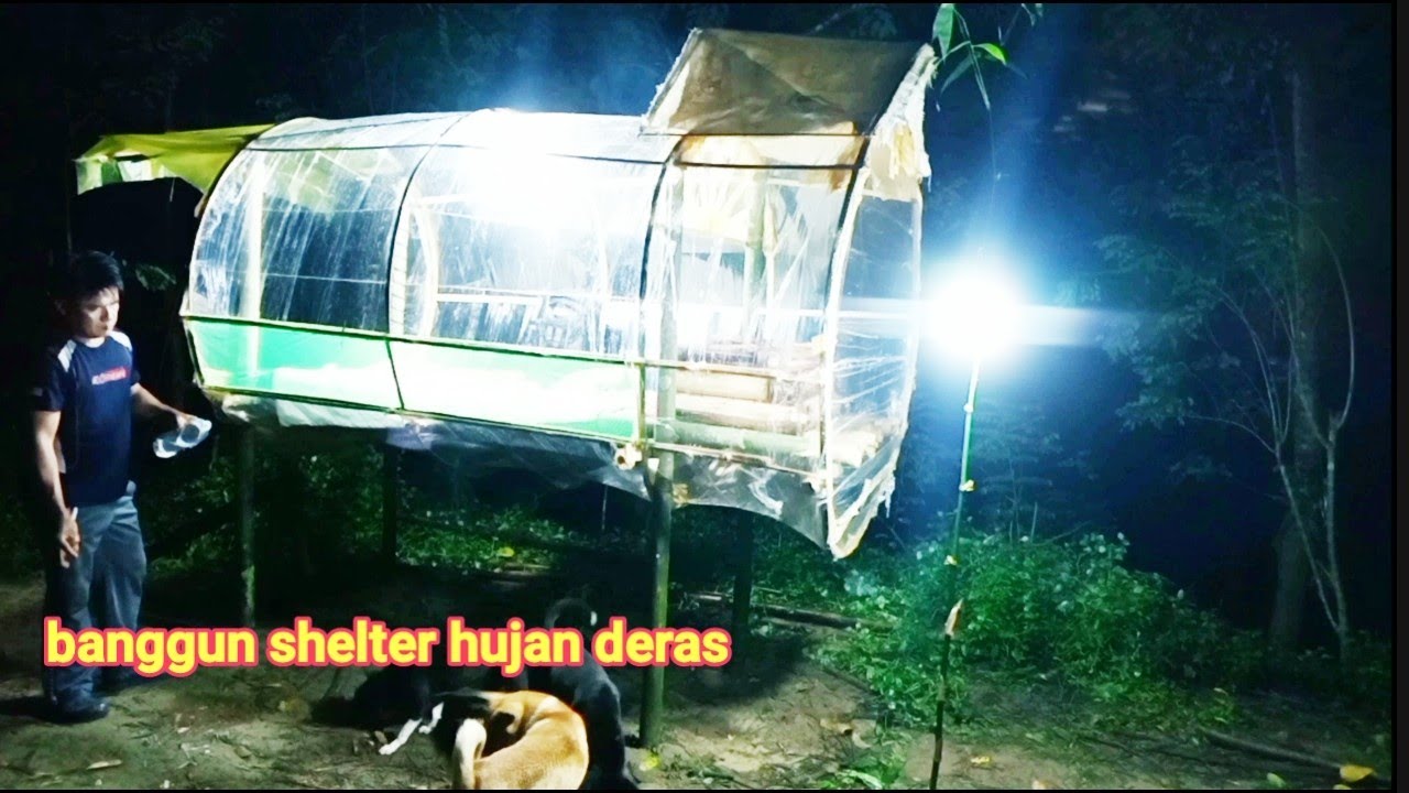 solo camping in rain storm and making shelter out of plastic wrap part ...