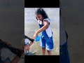 My girls making sand castle finding seashells and seeing rainbow 