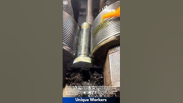 Bolt threading with a machine: people creating threads on a bolt with a machine