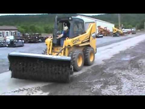 Skid steer sweeper