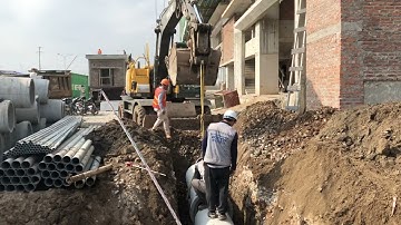 Máy xúc cẩu công thoát nước mưa lắp đặt tuyến công | Truck