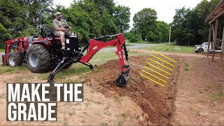Drainage Ditch Grade with a Tractor Backhoe