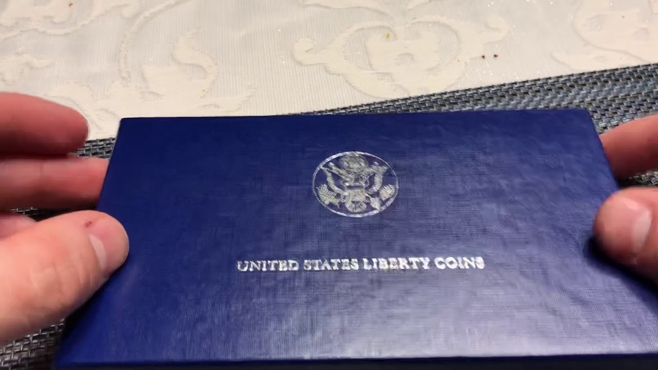 Silver! Dollar and Half Dollar Commemorating Ellis Island.