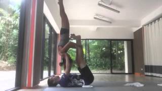 Acro Yoga - shoulderstand and folded leaf twist