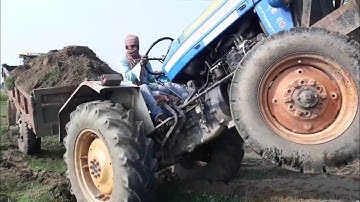 Powertrack 434 DS Plus tractor stuck in Mud. help jcb machine. tractor video. jcb video.