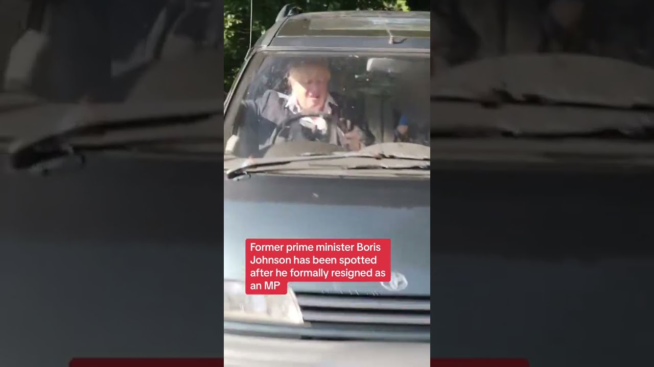 Former Prime Minister Boris Johnson Waves At Reporters After Resigning As MP