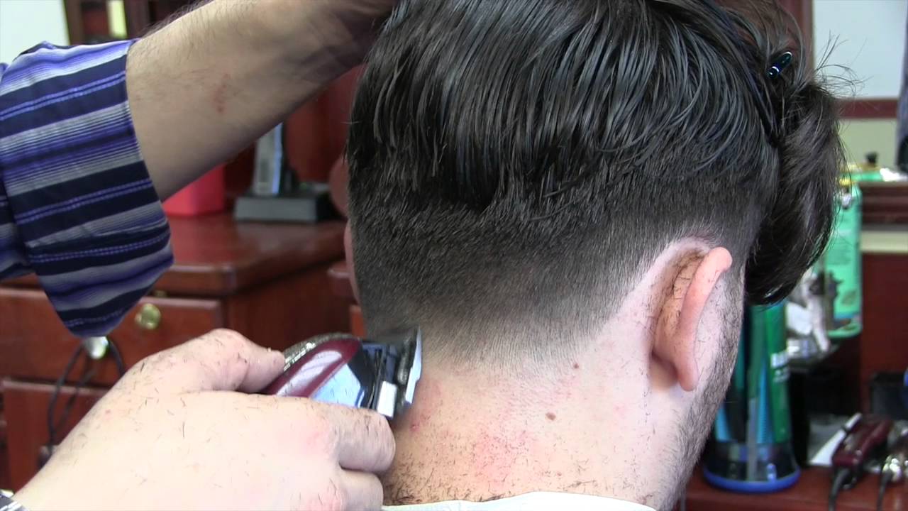 using clippers to trim hair