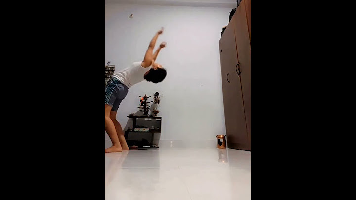 Yoga mishap: playful bending backwards leads to unintended chaos!